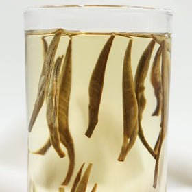 TEARELAE brewed cup reveals apricot-yellow tea with subtle sweetness.