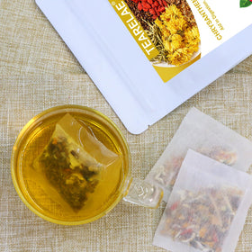 Close-up of TEARELAE tea bags highlighting the aromatic herbal blend.