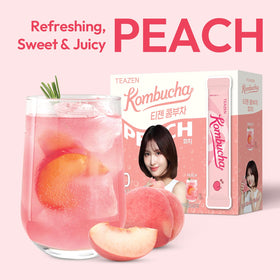 TEAZEN Peach Kombucha in a glass with ice for refreshing hydration.