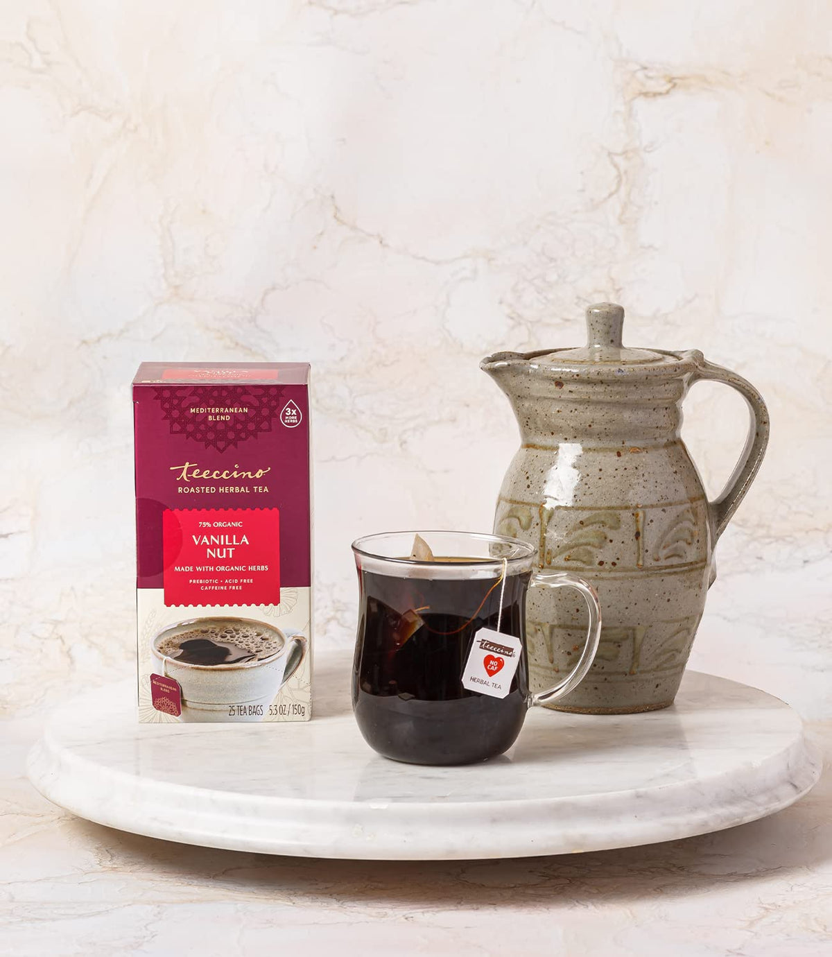 Teeccino Vanilla Nut Tea bag in hand, ready to steep
