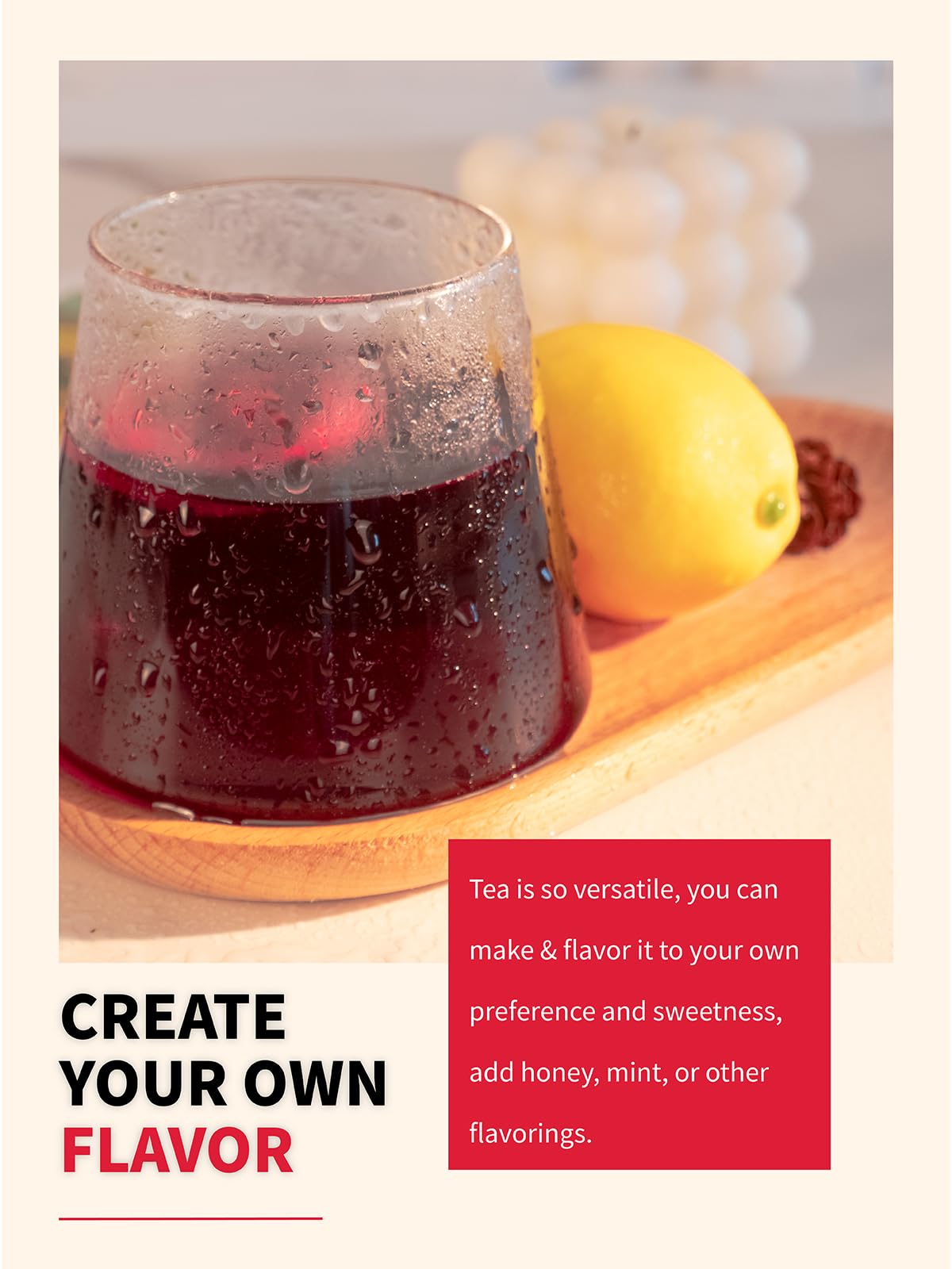 Brewed TeeLux hibiscus iced tea in a clear pitcher with vibrant red color.
