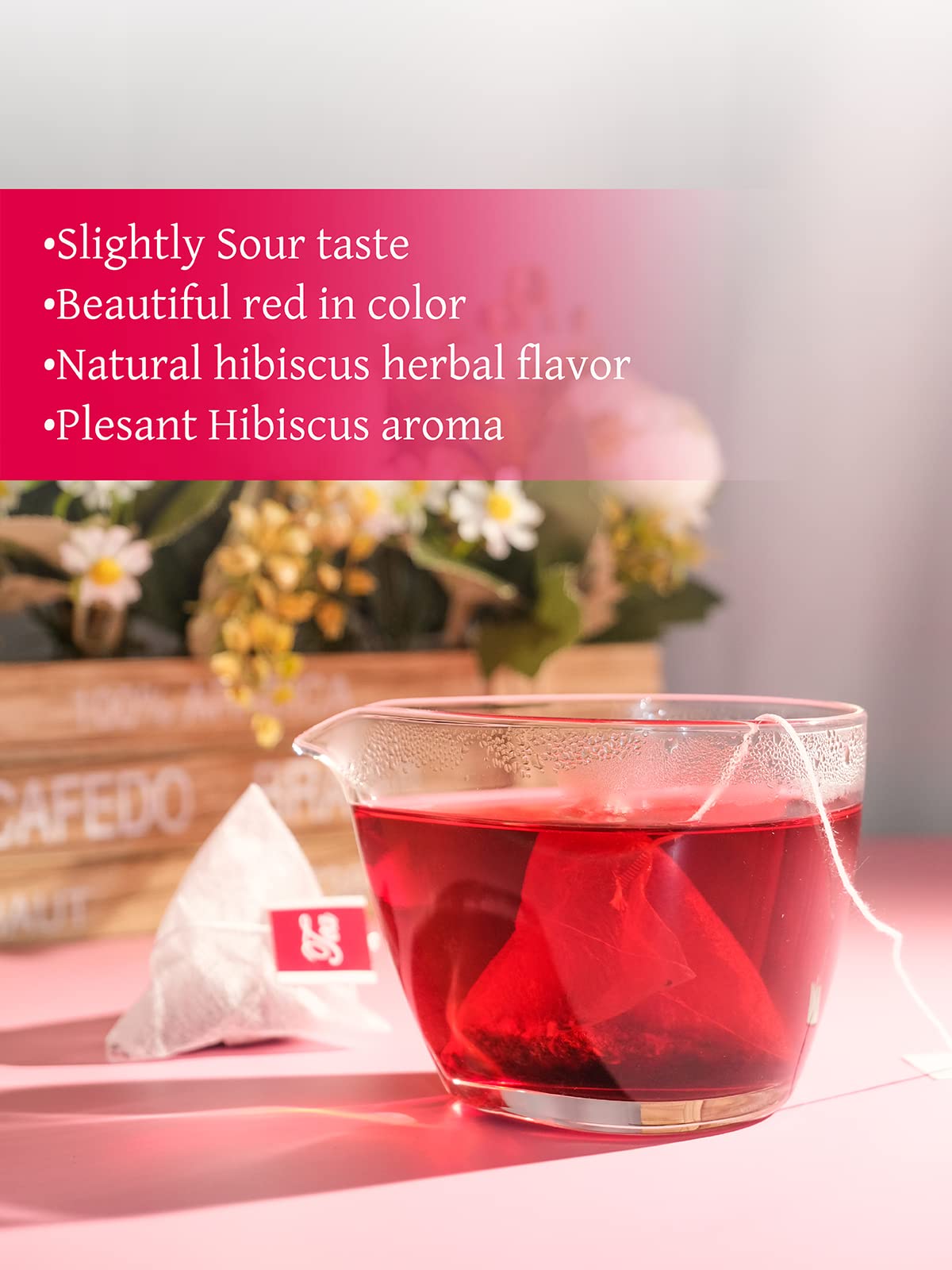 TeeLux hibiscus tea bags closeup with dried flowers shows vibrant color and natural flavor