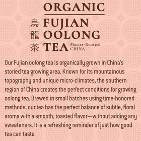 Tejava Origins Fujian Oolong glass bottle on table, premium unsweetened tea