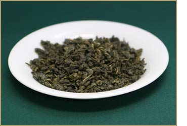 Ten Ren King's 103 Green Ginseng Oolong in a cup, ideal for a relaxing tea moment