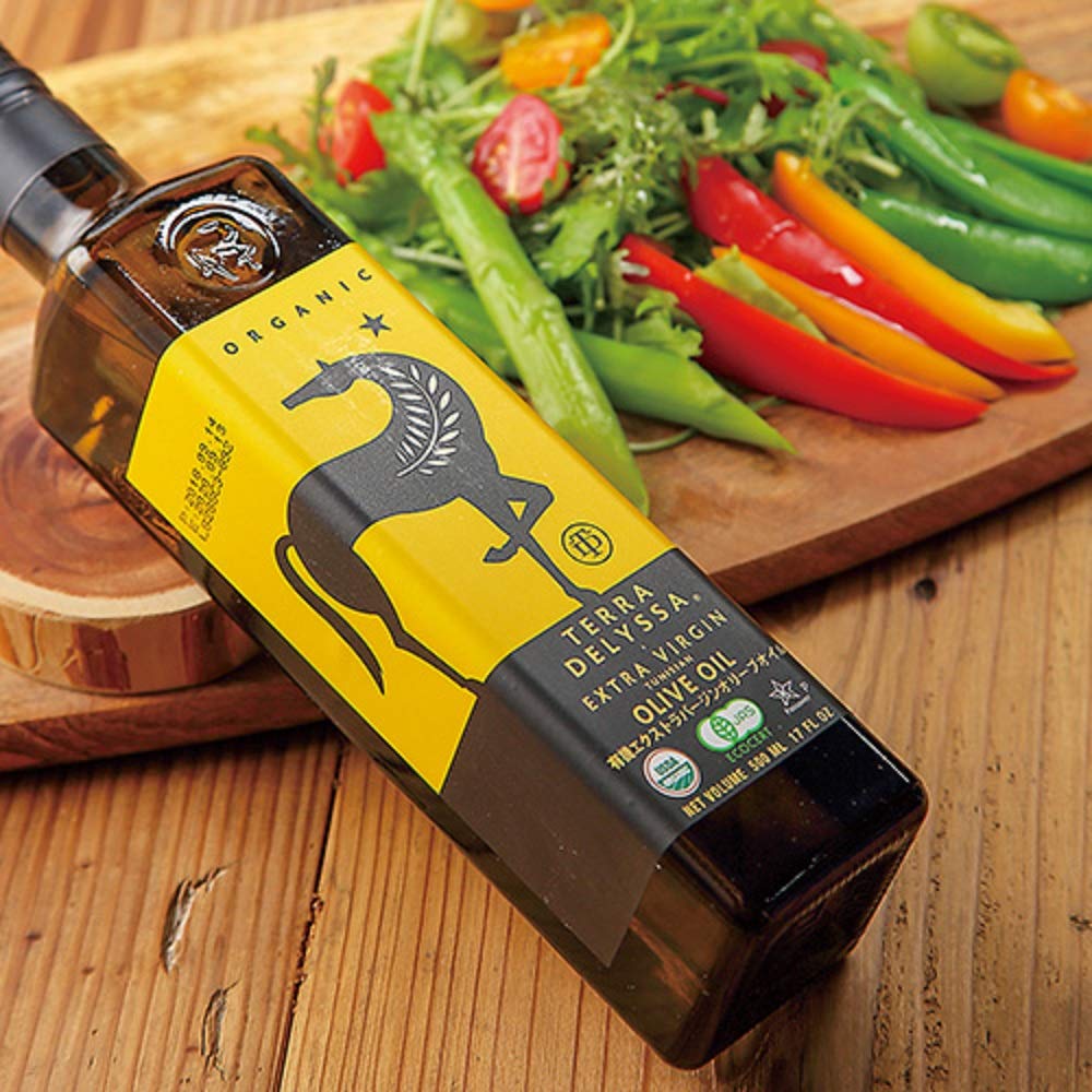 Terra Delyssa dark glass olive oil bottle preserves freshness by shielding oil from light and oxygen