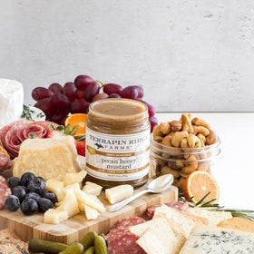 Terrapin Ridge Pecan Honey Mustard on a cheese board to boost flavor.