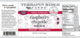 Terrapin Ridge Raspberry Chipotle Sauce on a cheese board, versatile glaze for entertaining