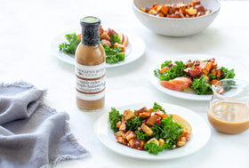 Terrapin Ridge Salad dressing with goat cheese and pecans on greens.