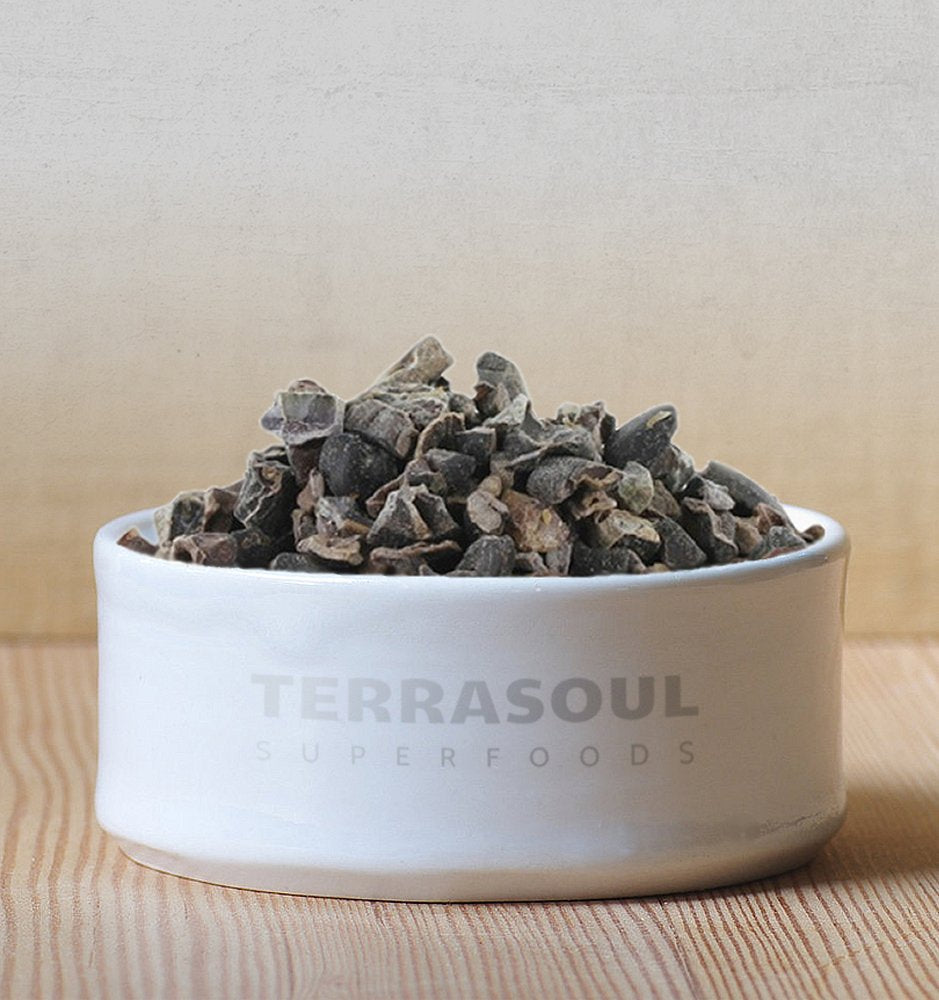 Terrasoul cacao nibs in a bowl, adds rich cocoa crunch to oatmeal.