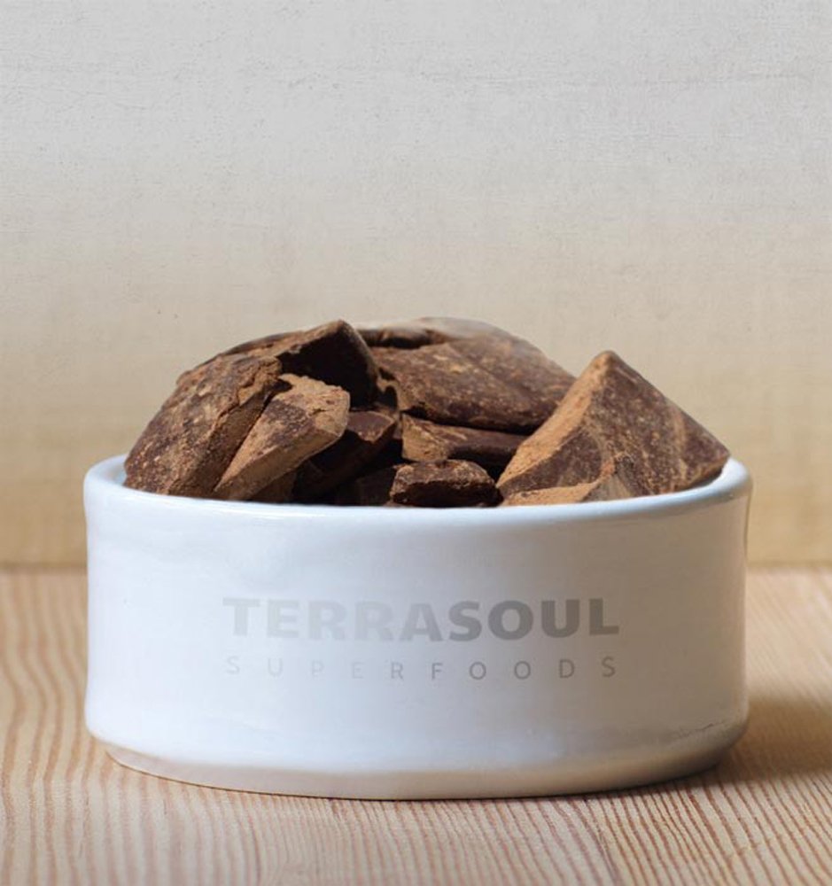 Terrasoul cacao paste texture closeup reveals rich, gourmet chocolate base.