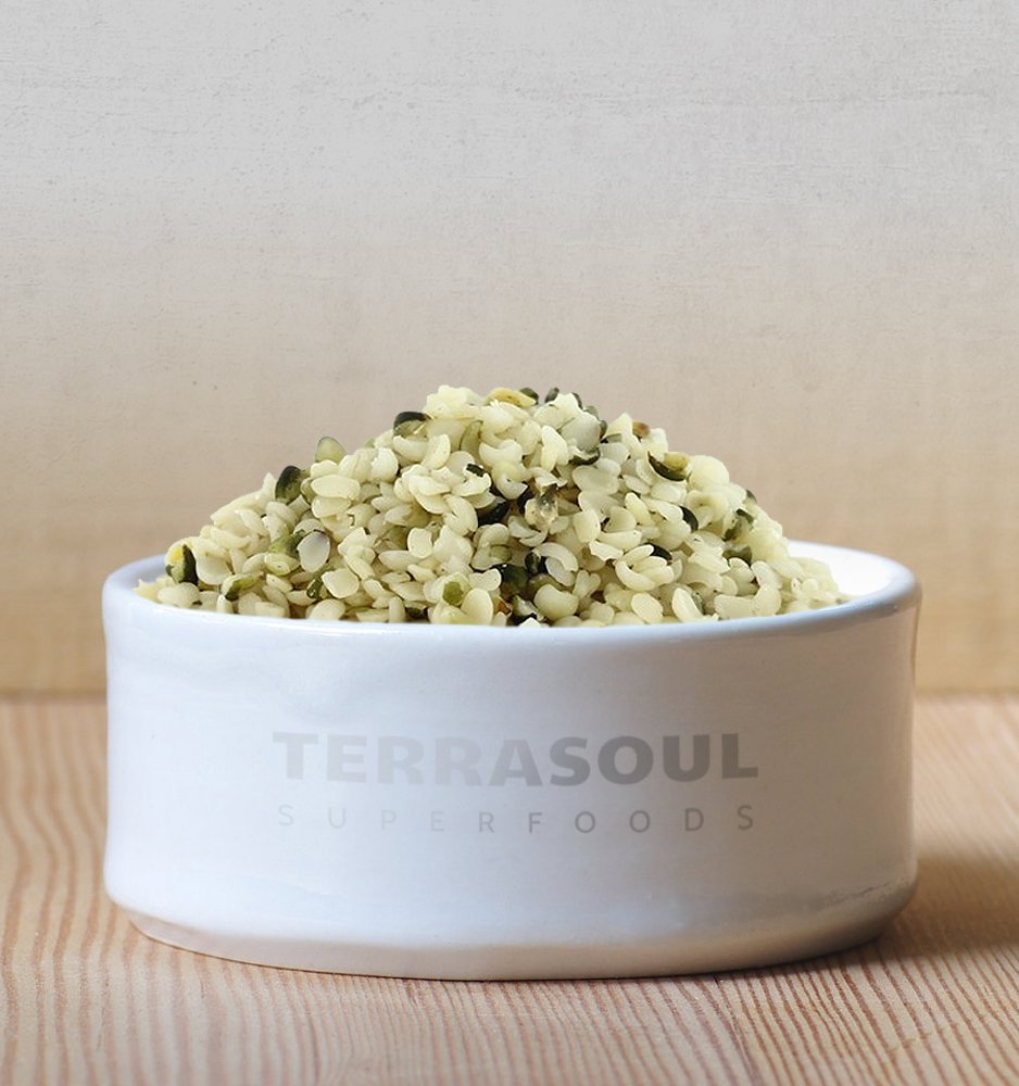Terrasoul Hemp Seeds pouring into a smoothie, demonstrating creamy texture and protein.