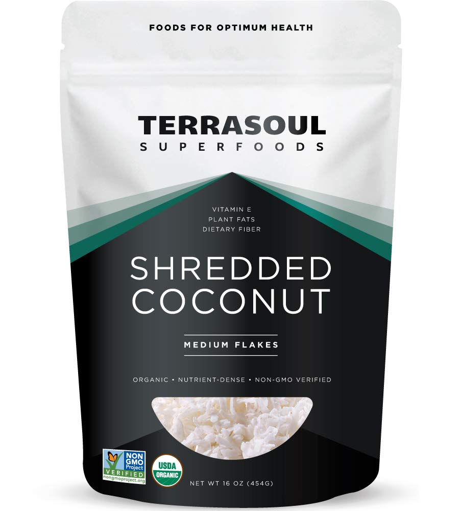 Terrasoul Organic Coconut Flakes bowl closeup showing unsweetened texture ideal for baking.
