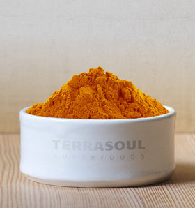 Terrasoul Organic Turmeric Powder close-up reveals fine golden powder for spice blends.