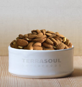 Terrasoul organic almonds in a snack bowl suggest versatile baking use.