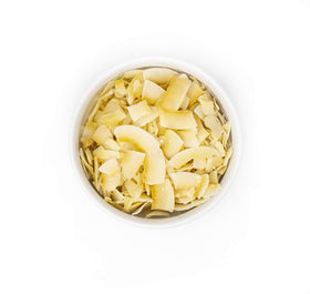 Close-up of Terrasoul coconut chips highlighting light, golden toasting and crisp bite.