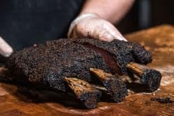 Terry Black's Barbecue Beef Dry Rub crust development enhances smoking or roasting with rich aroma.