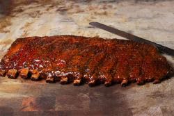Pork butt prepped with Terry Black's Dry Rub before slow roasting