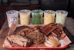 Ribs seasoned with Terry Black's Dry Rub for smoky flavor