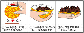 Terry's Chocolate Orange Dark Ball sliced view highlights rich chocolate and orange center