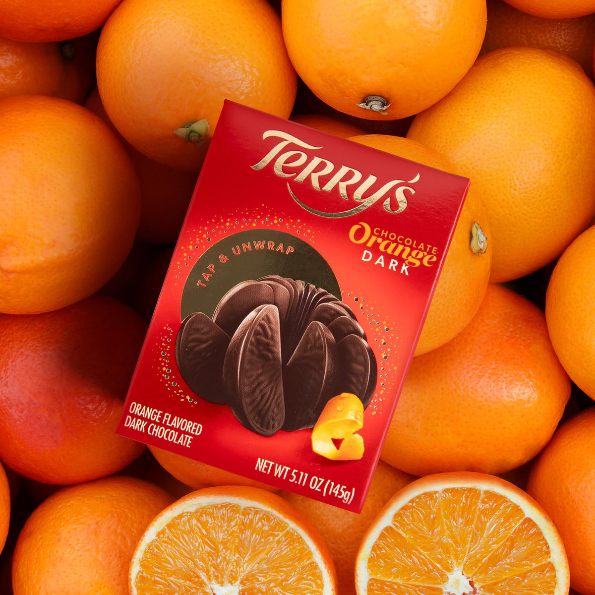 Close-up of Terry's Chocolate Orange slices showing rich chocolate and orange aroma.