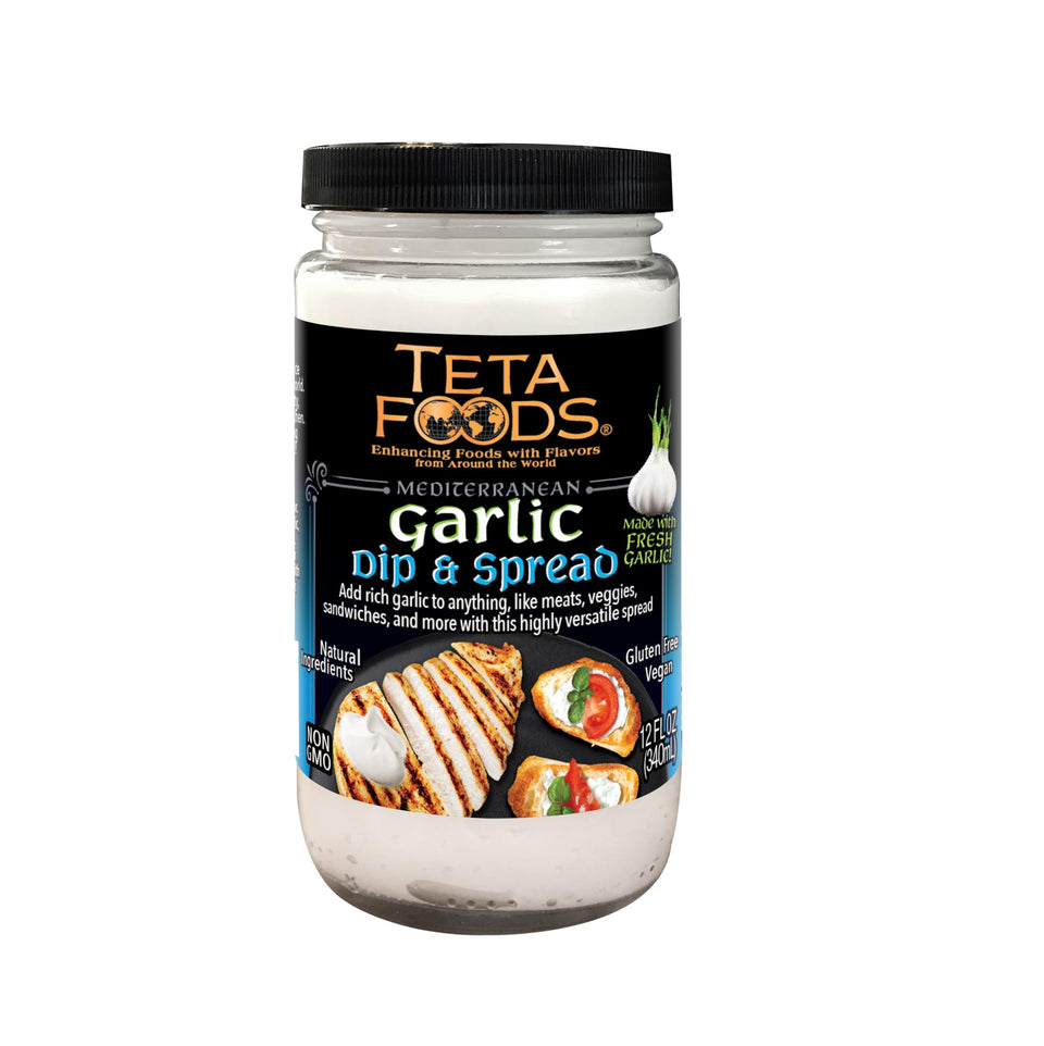 TETA FOODS Toum garlic dip close-up with garlic cloves for rich flavor