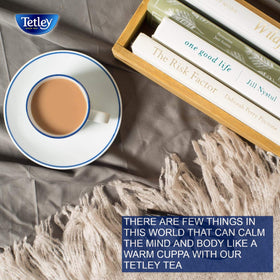 Tetley tea aroma rising from a steaming cup, inviting a comforting break.