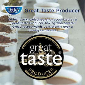 Tetley tea bags stack ready for brewing moments.