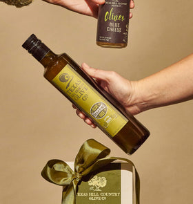 Texas Hill Country Olive Co. Extra Dirty Martini Olive Juice in martini glass for cocktails