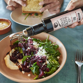 TEXAS HILL COUNTRY OLIVE CO. Fig Infused Balsamic Vinegar dressing idea on greens