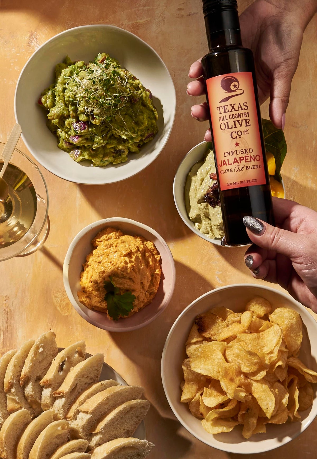Texas Hill Country Olive Co Jalapeño Infused Olive Oil label close-up conveys premium packaging.
