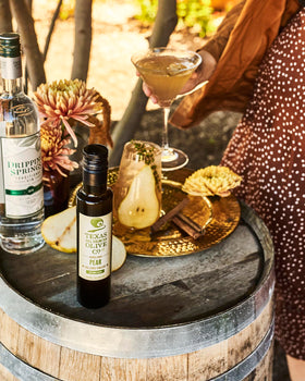 Texas Hill Country Olive Co. pear balsamic dressing pour enhances greens with fruity tartness