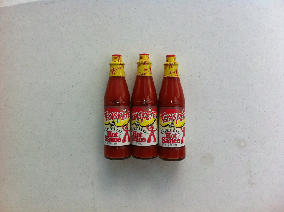 Texas Pete Garlic Hot Sauce 3-pack bottles add bold flavor to eggs, wings, and tacos.