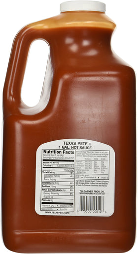 Texas Pete Original Hot Sauce bottle pour, great for wings, tacos, and everyday meals.