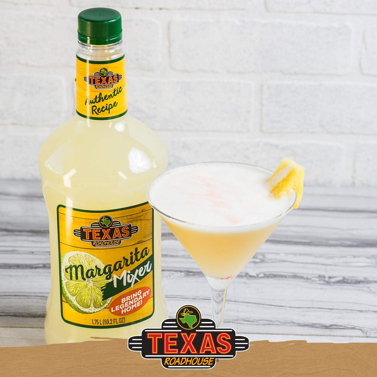 Texas Roadhouse margarita mix label closeup shows lime and oils.
