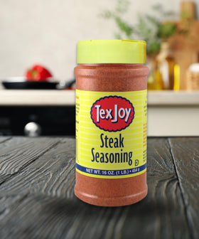 TexJoy steak seasoning shaker on grill boosts grilled flavor and aroma