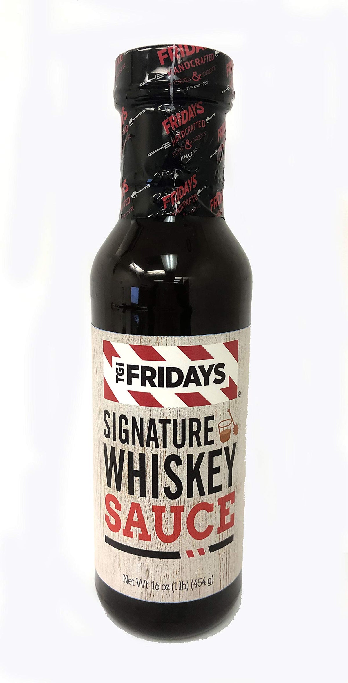 T.G.I. Friday's Signature Whiskey Sauce bottle, ideal for grilling and dipping.