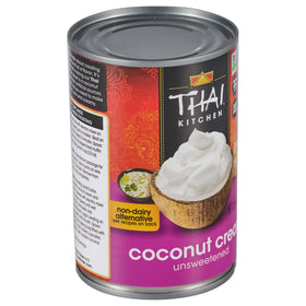 Thai Kitchen Coconut Cream pouring into curry for luxuriously rich sauce.