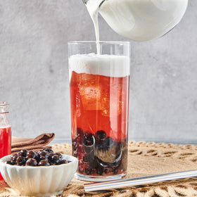 Thai Kitchen coconut milk smoothie visual for creamy drinks.