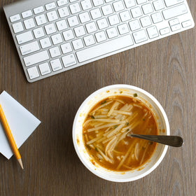 Thai Kitchen Lemongrass & Chili flavor bowl close-up with lime, garlic, and vibrant herbs.