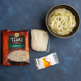 Thai Kitchen microwave-ready noodle soup bowl suggests fast, satisfying meals during busy days.