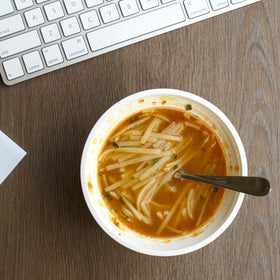 Thai Kitchen serving idea bowl and spoon conveys ready-to-serve convenience.