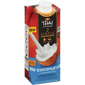 Thai Kitchen Lite Coconut Milk pour showing smooth texture ideal for curries and smoothies.