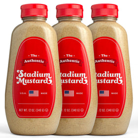 The Authentic Stadium Mustard bottle on a grill showing classic ballpark flavor