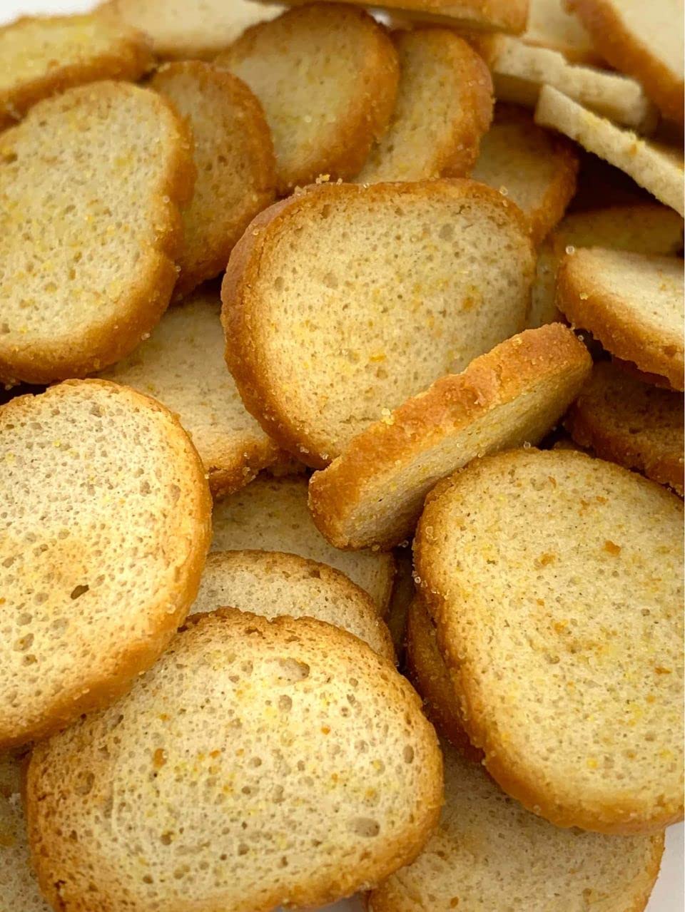 Garlic bagel chips paired with dips or snacks for easy on-the-go crunch