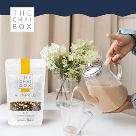 The Chai Box brew in cup shot invites a comforting ritual and flavorful sip.