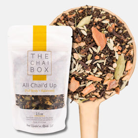 The Chai Box loose-leaf tea packaging with premium spices for a cozy brew.