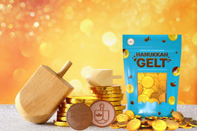 The Dreidel Company Hanukkah gelt with menorah design, perfect for decorating and sharing.