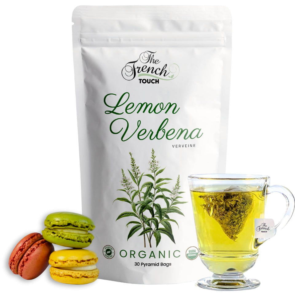 The French Touch Lemon Verbena Tea pyramid bag steeping for a fragrant caffeine-free infusion.