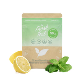 The Fresh Test 50g glucose packet on a counter for quick wellness checks