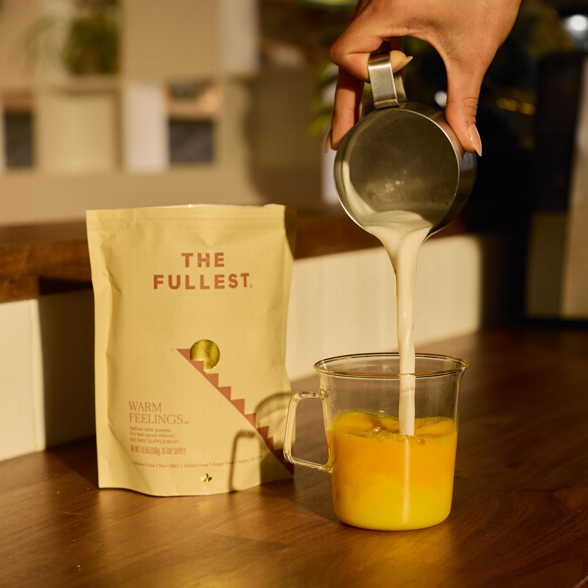 Close-up of saffron threads and coconut milk powder highlighting premium ingredients.